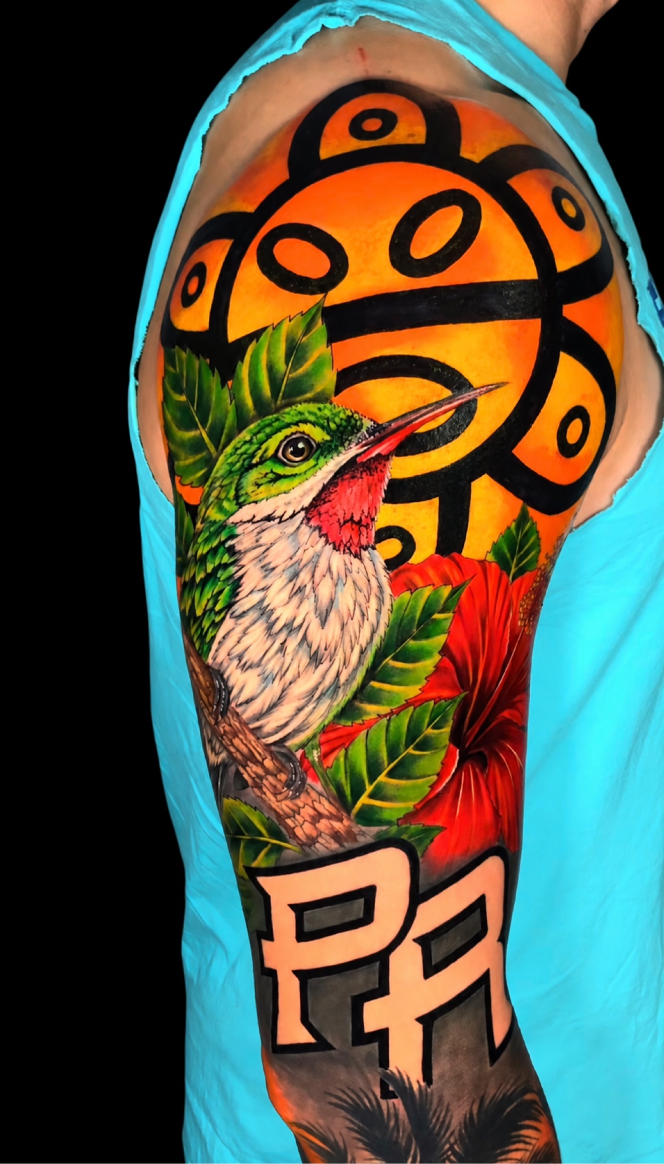 Color taino hummingbird tattoo by Yudisnel Reina